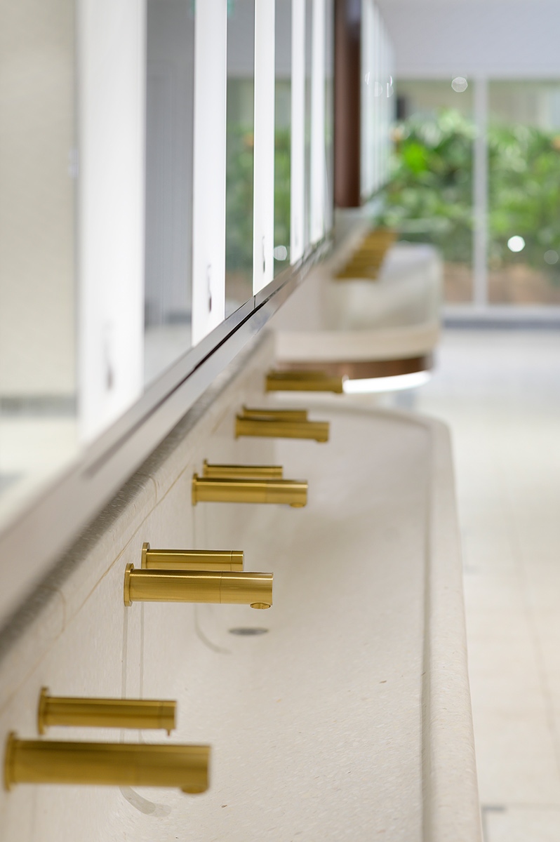 Communal basin with curved perimeter and taps in PVD coloured stainless steel Bronze No 4 Brushed finish.  Project: WCs upgrade, Victoria Station, London Client: Network Rail Architects: Landolt + Brown Fitout: Maxwood Washrooms PVD coloured stainless steel by Double Stone Steel Architectural metalwork by John Desmond Ltd Communal basin with curved perimeter and taps in PVD coloured stainless steel Bronze No 4 Brushed finish.  Project: WCs upgrade, Victoria Station, London Client: Network Rail Architects: Landolt + Brown Fitout: Maxwood Washrooms PVD coloured stainless steel by Double Stone Steel Architectural metalwork by John Desmond Ltd