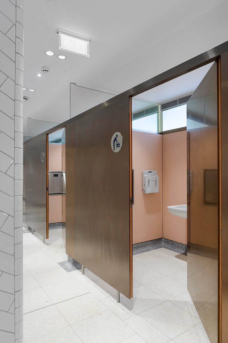 Toilet cubicles with calming colour palette interior, down-to-the- floor partition and PVD coloured stainless steel doors in Rose Gold Hairline.  Project: WCs upgrade, Victoria Station, London Client: Network Rail Architects: Landolt + Brown Fitout: Maxwood Washrooms PVD coloured stainless steel by Double Stone Steel Architectural metalwork by John Desmond Ltd Toilet cubicles with calming colour palette interior, down-to-the- floor partition and PVD coloured stainless steel doors in Rose Gold Hairline.  Project: WCs upgrade, Victoria Station, London Client: Network Rail Architects: Landolt + Brown Fitout: Maxwood Washrooms PVD coloured stainless steel by Double Stone Steel Architectural metalwork by John Desmond Ltd