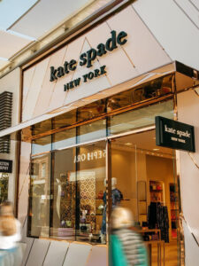 Canopy, glazing bars and inset detail in PVD coloured stainless steel Rose Gold Mirror. - Kate Spade, 4525 La Jolla Village Dr Suite D27, Westfield UTC, San Diego, California. - Architectural Metalwork: Double Stone Steel in partnership with John Desmond Ltd.